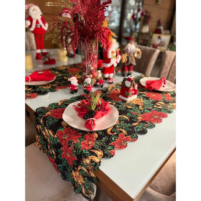 Caminho de mesa navideño negro con flores de pascua rojas y moños dorados